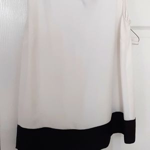 White sleeveless blouse